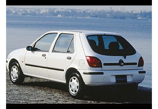 MAZDA 121 hatchback biały tylny lewy
