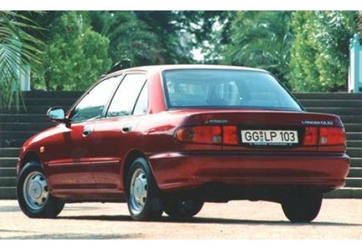 MITSUBISHI Lancer sedan bordeaux (czerwony ciemny) tylny lewy
